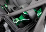 Traxxas X-Maxx Ultimate Green-X – nærbilde av understell med grønne aluminiumsdeler